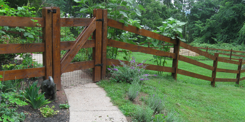 A fence on a sloping hill