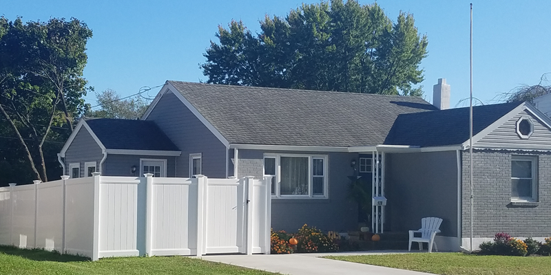 House with white fence