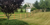 Wooden slat fence on hill